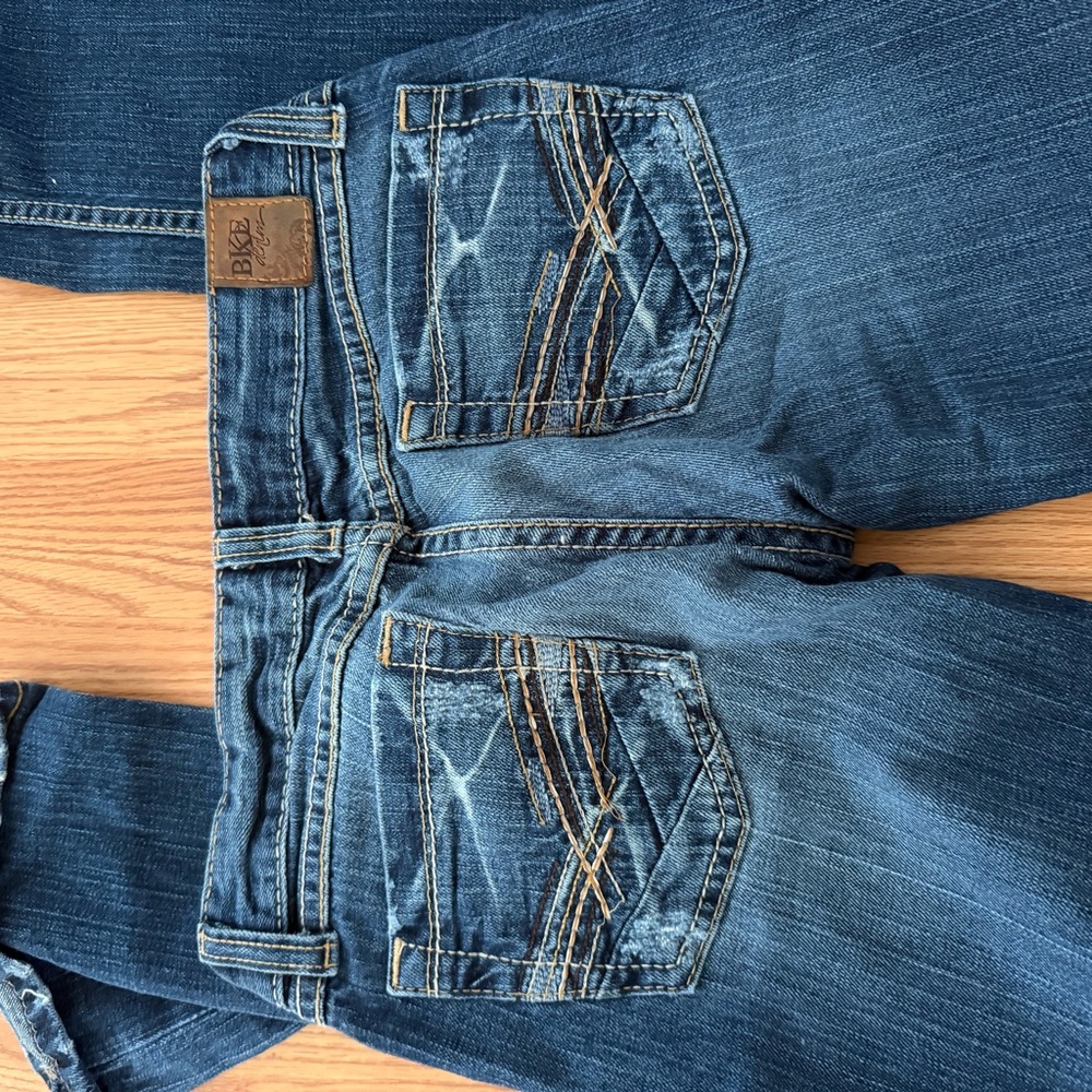 BKE Women's Medium Blue Distressed Pocket Jeans